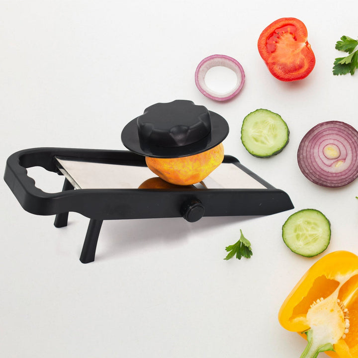 Adjustable grater and slicer